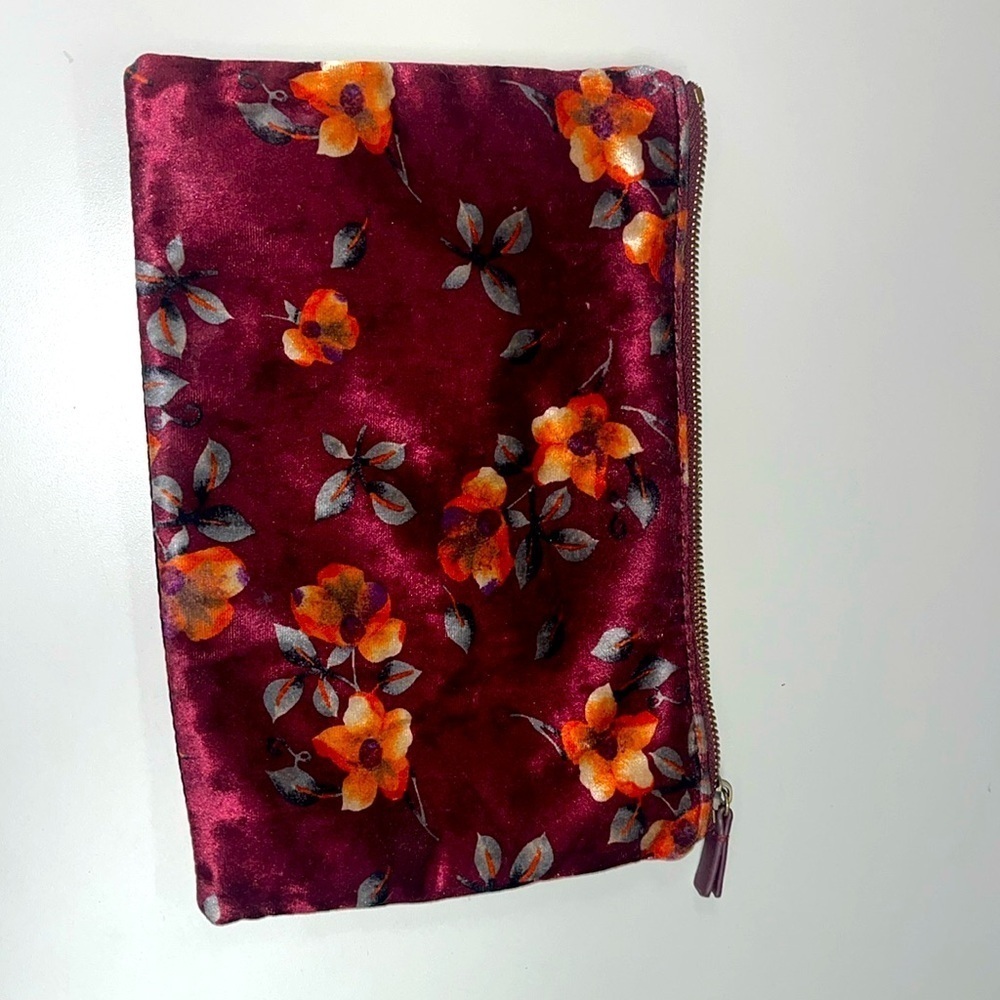 Remi Reid anthropologie large cosmetic bag, maroon velvet like floral fabric.